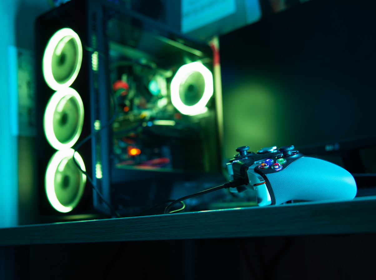 Game controller with a glass pc case with rgb lighting